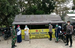 Pendisiplinan ProkesTerus Dilakukan Babinsa Koramil 09/Langgam Bersama Polri dan Tim Kesehatan