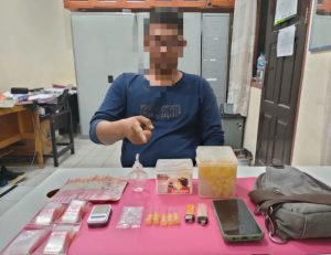 Resnarkoba Polres Kampar Tangkap Pengedar Shabu Diareal Perkebunan Sawit Desa Merangin