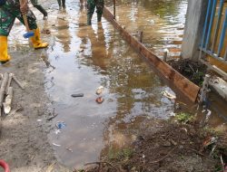 Kendala di Lokasi Sasaran tidak Menyurutkan Semangat Anggota Satgas TMMD Ke- 115 Lakukan Pengerjaan Sasaran