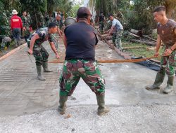 Walau Cuaca Hujan dan Panas, Satgas TMMD Ke -115 Kodim 0313/KPR Tetap Semangat Selesaikan Pembangunan Jalan