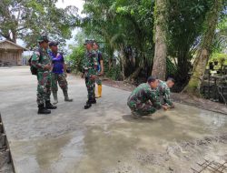 Satgas TMMD ke 115 Kodim 0313/KPR Melanjutkan Kegiatan Semenisasi Jalan di Kelurahan Teluk Meranti 