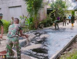Satgas TMMD Ke -115 Kodim 0313/Kpr Menyiramkan Aspal Panas ke Semenisasi Jalan Guna Lebih Tahan Lama