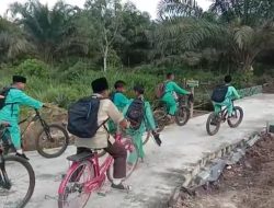 Keceriaan Murid-murid SDN 015 Teluk Punak Nikmati Hasil TMMD Ke- 115 Kodim 0313/KPR