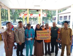 Ikut Serta Penyaluran BLT- DD, Babinsa Koramil 16/Tapung Himbau Agar Bantuan Digunakan Secara Bijak