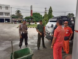 Babinsa Koramil 14/Kepenuhan dan Kepolisian Kepenuhan Sambangi Objek Vital SPBU