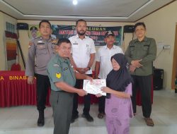 Babinsa Koramil 05/Kampar Kiri dan Bhabinkamtibmas Dampingi Penyaluran BLT- DD