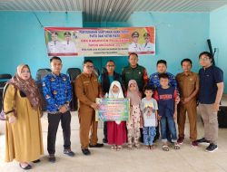 Babinsa 09/ Langgam Amankan Pembagian Penyerahan Santunan Anak Yatim Piatu
