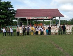 Dukung HUT Desa Binaan, Babinsa Koramil 16/Tapung Amankan Jalannya Kegiatan Karnaval