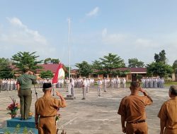 Kodim 0313/kpr dan Jajaran Laksanakan Upacara Bendera Serentak di Sekolah
