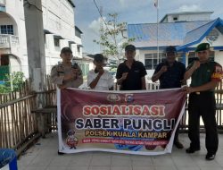 Sosialisasikan Program Saber Pungli di Desa Binaan, Babinsa dan Bhabinkantimas Himbau Warga Lawan Serta Laporkan Pungli
