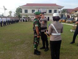 Anggota Jajaran Kodim 0313/KPR Ikuti Apel Gelar Pasukan Operasi Keselamatan 2025