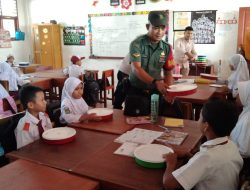 Makan Bergizi Gratis, Babinsa 09/Langgam Dampingi Pendistribusian Makan Bergizi Kesekolah
