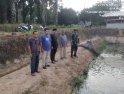Sertu Purwanto Hadiri Panen Ikan Patin Program Ketahanan Pangan di Desa Pulau Gadang