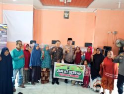 Kapolsek Kampar dan Kades Pulau Sarak Serahkan Bantuan Sembako Kepada Warga Kurang Mampu