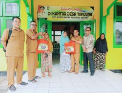 Pemdes Tanjung Salurkan Bantuan Beras Dari Pemerintah Kabupaten Kampar