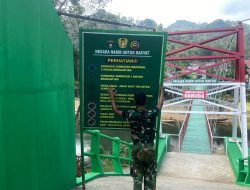 Tandai Akhir Pengerjaan Fisika, Satgas Kodim 0313/KPR Pasang Plang Jembatan Sungai Subayang